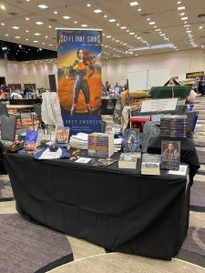 a table with books for sale by Cidney Swanson